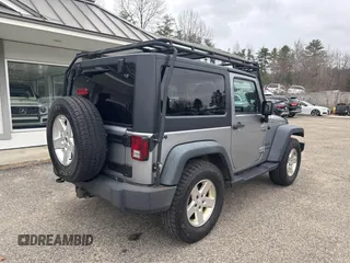 2013 Jeep Wrangler Sport with VIN 1C4AJWAG7DL605881, listed as a IAAI auction lot 41980930 with 214,662 mi miles and . Bid and sale history available at carsss.com. Image 4.