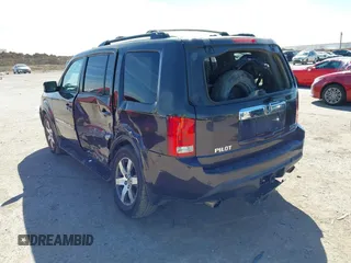 2012 Honda Pilot Touring with VIN 5FNYF4H99CB069996, listed as a IAAI auction lot 41809046 with 140,836 mi miles and . Bid and sale history available at DreamBid. Image 3.