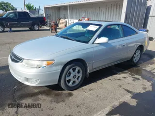 2001 Toyota Solara SE z VIN 2T1CF28P91C491927, wystawiony jako IAAI lot #42475651 z przebiegiem 142 628 mil mil oraz . Historia ofert i sprzedaży dostępna na DreamBid. Obrazek 2.