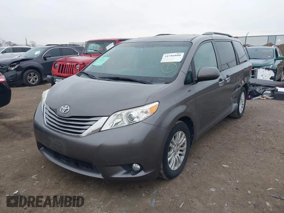 2016 Toyota Sienna XLE with VIN 5TDYK3DC8GS704330, listed as a IAAI auction lot 41586880 with 84,065 mi miles. Bid and sale history available at carsss.com. Image 2.