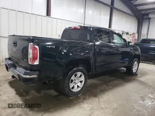 2015 GMC Canyon 4WD SLE with VIN 1GTG6BE38F1258880, listed as a Copart auction lot 57887664 with 142,346 mi miles and Salvage Title. Bid and sale history available at carsss.com. Image 3.