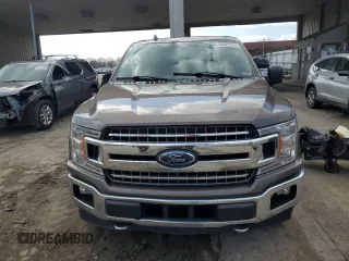 2018 Ford F-150 XL with VIN 1FTEW1EG1JKD01897, listed as a Copart auction lot 52923115 with 219,341 mi miles and Clean Title. Bid and sale history available at carsss.com. Image 5.