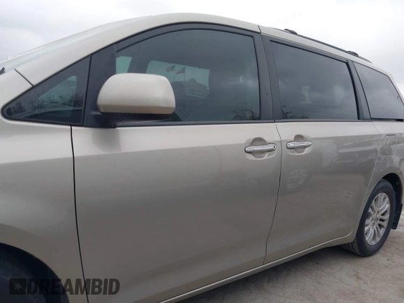 2015 Toyota Sienna XLE с VIN 5TDYK3DC4FS677254, выставлен на аукционе IAAI как лот 41708885 с пробегом 122 637 миль миль и . История ставок и продаж доступна на DreamBid. Изображение 14.