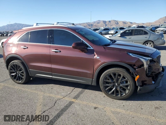 2023 Cadillac XT4 AWD Luxury with VIN 1GYFZBR42PF107893, listed as a Copart auction lot 74989124 with 9,579 mi miles and Salvage Title. Bid and sale history available at carsss.com. Image 4.