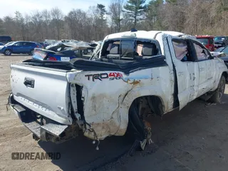 2017 Toyota Tacoma SR5 with VIN 3TMCZ5AN8HM064886, listed as a IAAI auction lot 41750826 with 163,398 mi miles and . Bid and sale history available at DreamBid. Image 4.