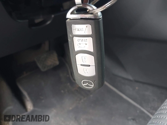 2014 Mazda 3 i Touring with VIN JM1BM1V72E1119890, listed as a IAAI auction lot 42531252 with 124,398 mi miles and . Bid and sale history available at DreamBid. Image 11.