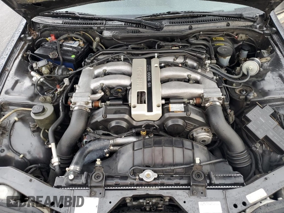 1990 Nissan 300ZX z VIN JN1RZ24A2LX013102, wystawiony jako Copart lot #73137144 z przebiegiem 147 952 mil mil oraz Szkody całkowita. Historia ofert i sprzedaży dostępna na DreamBid. Obrazek 13.