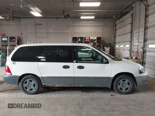 2006 Ford Freestar Cargo with VIN 2FTZA54666BA14556, listed as a IAAI auction lot 42103437 with 147,998 mi miles. Bid and sale history available at carsss.com. Image 13.