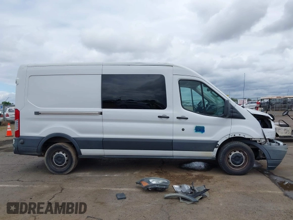 2015 Ford Transit Cargo with VIN 1FTNR2CMXFKA83472, listed as a IAAI auction lot 42212853 with 88,182 mi miles and . Bid and sale history available at DreamBid. Image 14.