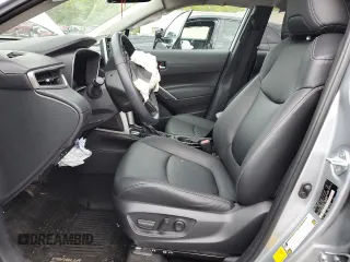 2022 Toyota Corolla Cross XLE with VIN 7MUDAABG2NV009663, listed as a Copart auction lot 55945735 with 59,473 mi miles and Salvage title. Bid and sale history available at DreamBid. Image 7.