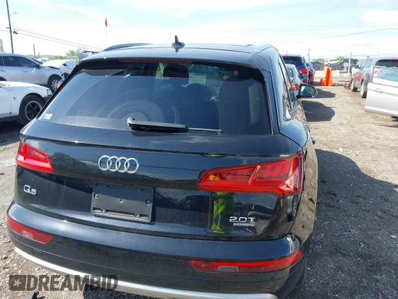 2018 Audi Q5 Premium with VIN WA1ANAFY1J2003708, listed as a IAAI auction lot 42116637 with 60,813 mi miles and . Bid and sale history available at DreamBid. Image 16.