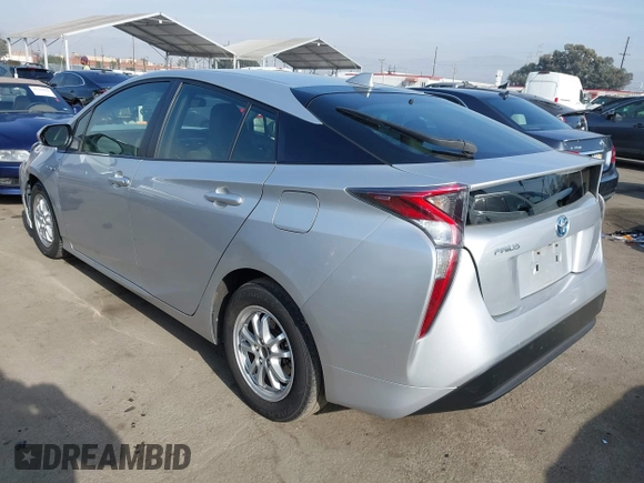 2016 Toyota Prius Two z VIN JTDKBRFU1G3016850, wystawiony jako IAAI lot #41163246 z przebiegiem 68 858 mil mil oraz . Historia ofert i sprzedaży dostępna na DreamBid. Obrazek 3.