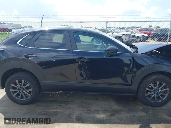 2021 Mazda CX-30 S with VIN 3MVDMBAL0MM254030, listed as a IAAI auction lot 42261180 with 72,459 mi miles and . Bid and sale history available at DreamBid. Image 13.