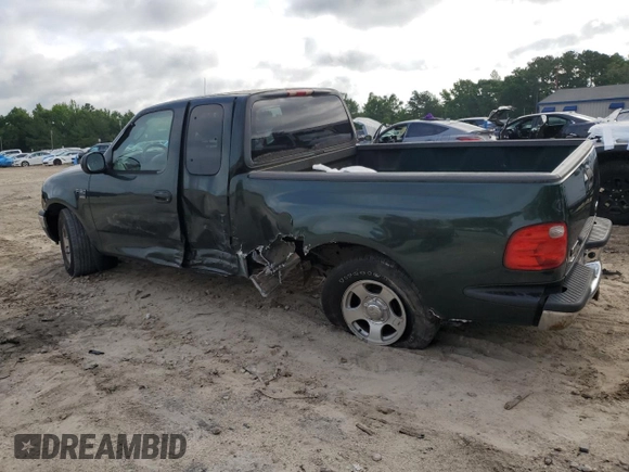 2003 Ford F-150 XL with VIN 1FTRX07WX3KB99581, listed as a Copart auction lot 56907765 with 232,597 mi miles and Salvage title. Bid and sale history available at DreamBid. Image 2.
