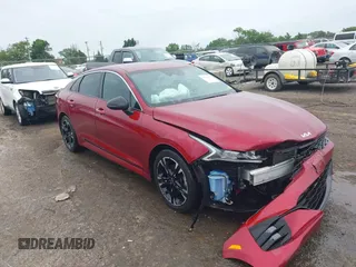 2022 Kia K5 GT-Line z VIN 5XXG64J20NG096268, wystawiony jako IAAI lot #42340895 z przebiegiem 71 930 mil mil oraz . Historia ofert i sprzedaży dostępna na DreamBid. Obrazek 1.