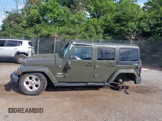 2015 Jeep Wrangler Unlimited Altitude z VIN 1C4HJWEG0FL752152, wystawiony jako IAAI lot #42311043 z przebiegiem 112 379 mil mil oraz . Historia ofert i sprzedaży dostępna na DreamBid. Obrazek 14.