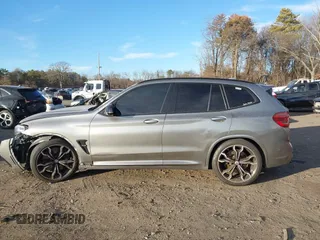 2021 BMW X3 M with VIN 5YMTS0C03M9F05142, listed as a IAAI auction lot 41264911 with 1 mi miles. Bid and sale history available at carsss.com. Image 14.