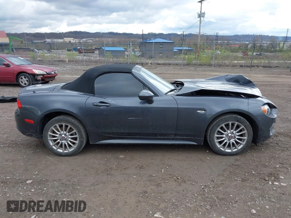 2017 FIAT 124 Spider Lusso z VIN JC1NFAEK7H0106877, wystawiony jako IAAI lot #42049505 z przebiegiem 54 487 mil mil oraz . Historia ofert i sprzedaży dostępna na DreamBid. Obrazek 14.