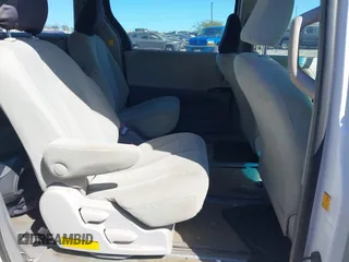 2012 Toyota Sienna with VIN 5TDZK3DC7CS203993, listed as a IAAI auction lot 41130289 with 177,059 mi miles. Bid and sale history available at carsss.com. Image 8.