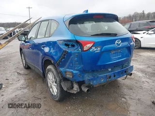 2014 Mazda CX-5 Sport with VIN JM3KE4BE6E0336504, listed as a IAAI auction lot 41961244 with 125,150 mi miles. Bid and sale history available at carsss.com. Image 6.