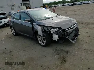2014 Ford Focus Titanium with VIN 1FADP3N24EL269008, listed as a Copart auction lot 56396975 with 116,856 mi miles and Salvage title. Bid and sale history available at DreamBid. Image 13.