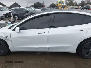 2023 Tesla Model 3 with VIN 5YJ3E1EA8PF578199, listed as a IAAI auction lot 41735465 with 50,823 mi miles and . Bid and sale history available at DreamBid. Image 14.