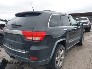 2011 Jeep Grand Cherokee Overland with VIN 1J4RS6GT7BC518123, listed as a IAAI auction lot 41277374 with 163,752 mi miles and . Bid and sale history available at DreamBid. Image 4.