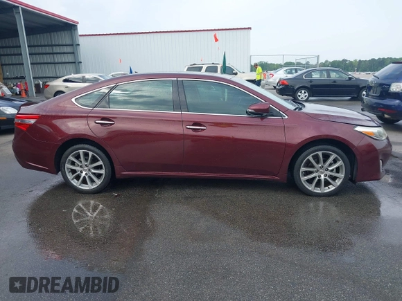 2014 Toyota Avalon Limited with VIN 4T1BK1EB3EU113035, listed as a IAAI auction lot 42040239 with 118,609 mi miles. Bid and sale history available at carsss.com. Image 12.