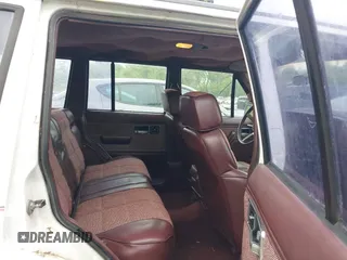 1991 Jeep Cherokee with VIN 1J4FJ58S3ML563620, listed as a IAAI auction lot 42131093 with 198,942 mi miles and . Bid and sale history available at DreamBid. Image 8.