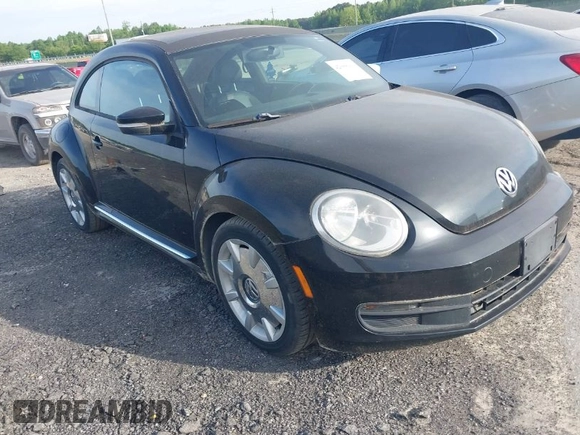 2013 Volkswagen Beetle 2.5L with VIN 3VWJP7AT1DM608370, listed as a IAAI auction lot 42088900 with Not Provided miles and . Bid and sale history available at DreamBid. Image 1.