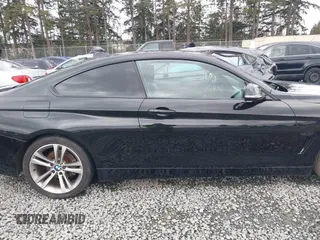 2014 BMW 4 Series 428i with VIN WBA3N3C50EK230489, listed as a IAAI auction lot 41613944 with 86,553 mi miles and . Bid and sale history available at DreamBid. Image 14.