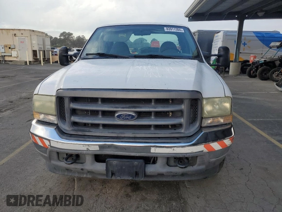 2002 Ford F-250 XL with VIN 1FTNX20F22ED31685, listed as a Copart auction lot 83911384 with 276,778 mi miles and Salvage title. Bid and sale history available at DreamBid. Image 5.