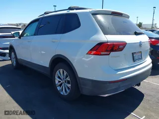 2018 Volkswagen Tiguan S with VIN 3VV0B7AXXJM109354, listed as a IAAI auction lot 41841556 with 67,798 mi miles. Bid and sale history available at carsss.com. Image 3.