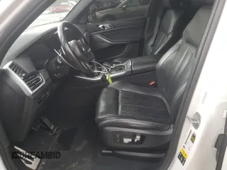 2020 BMW X5 M50i with VIN 5UXJU4C02L9C46464, listed as a Copart auction lot 43455805 with 89,337 mi miles and Salvage Title. Bid and sale history available at DreamBid. Image 7.