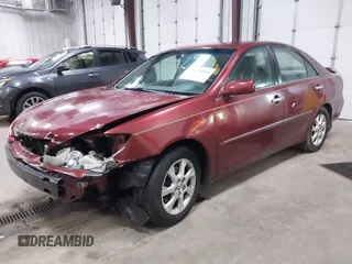 2005 Toyota Camry LE with VIN 4T1BF30KX5U099450, listed as a IAAI auction lot 41670099 with Not Provided miles and . Bid and sale history available at DreamBid. Image 2.