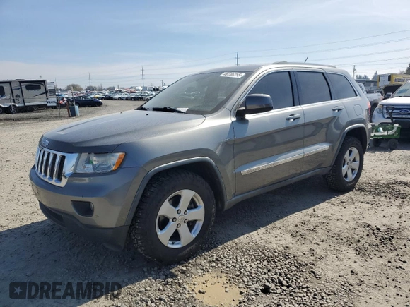 2011 Jeep Grand Cherokee Laredo with VIN 1J4RR4GGXBC702300, listed as a Copart auction lot 49736255 with 163,684 mi miles and Salvage Title. Bid and sale history available at carsss.com. Image 1.