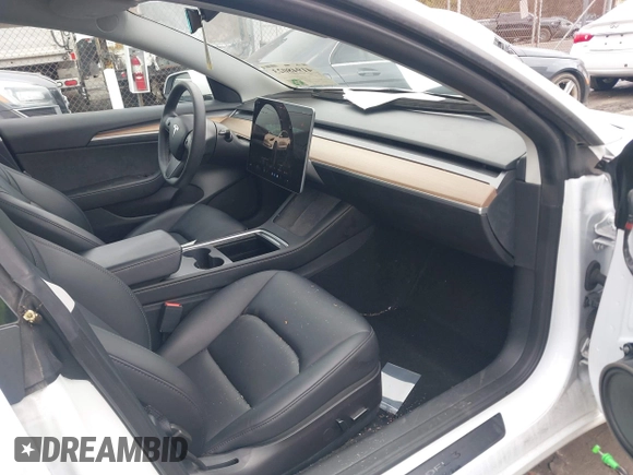 2023 Tesla Model 3 с VIN 5YJ3E1EA2PF475070, выставлен на аукционе IAAI как лот 41948023 с пробегом 61 178 миль миль и . История ставок и продаж доступна на DreamBid. Изображение 5.