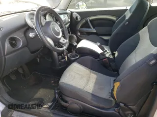 2006 MINI Hardtop with VIN WMWRC33546TK70683, listed as a Copart auction lot 54929365 with 109,484 mi miles and Salvage title. Bid and sale history available at DreamBid. Image 7.