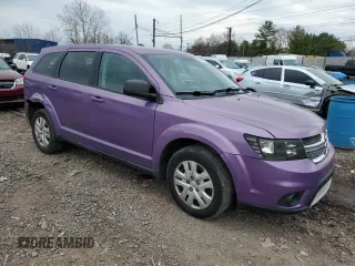 2014 Dodge Journey American Value Pkg with VIN 3C4PDCAB3ET241727, listed as a Copart auction lot 50525965 with 173,244 mi miles and Salvage Title. Bid and sale history available at carsss.com. Image 4.