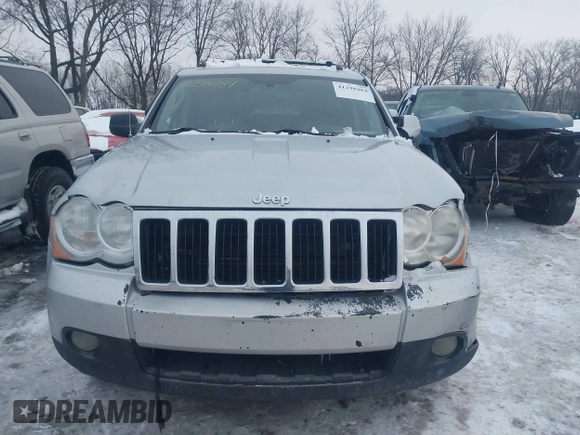 2008 Jeep Grand Cherokee with VIN 1J8HS58M58C117397, listed as a IAAI auction lot 41298484 with 208,095 mi miles and . Bid and sale history available at DreamBid. Image 12.