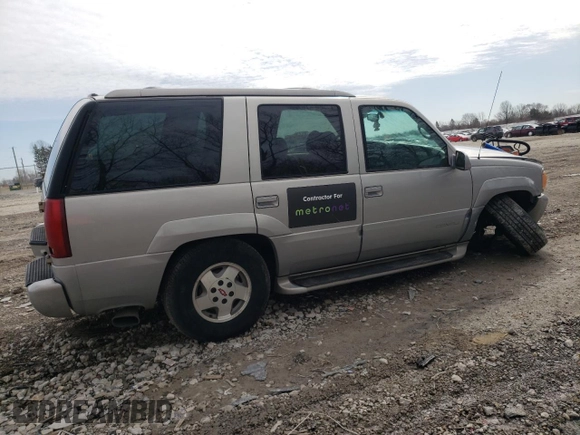 1999 GMC Denali with VIN 1GKEK13R0XR915053, listed as a Copart auction lot 49241145 with 2,664,121 mi miles and Salvage Title. Bid and sale history available at carsss.com. Image 3.