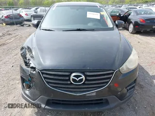 2016 Mazda CX-5 Sport with VIN JM3KE4BY8G0746377, listed as a IAAI auction lot 41990988 with 144,558 mi miles and . Bid and sale history available at carsss.com. Image 12.