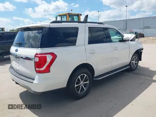 2019 Ford Expedition XLT z VIN 1FMJU1HT3KEA07331, wystawiony jako IAAI lot #42201946 z przebiegiem 100 990 mil mil oraz . Historia ofert i sprzedaży dostępna na DreamBid. Obrazek 4.