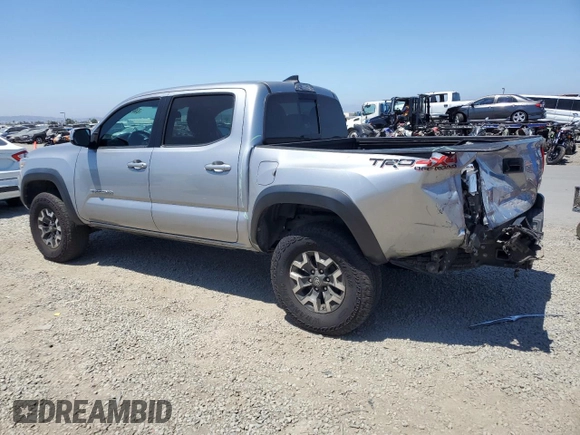 2018 Toyota Tacoma SR with VIN 3TMCZ5AN6JM129370, listed as a Copart auction lot 63042425 with 65,189 mi miles and Salvage title. Bid and sale history available at DreamBid. Image 2.