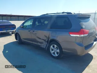 2012 Toyota Sienna LE AAS with VIN 5TDKK3DC8CS269924, listed as a IAAI auction lot 41764722 with 176,968 mi miles. Bid and sale history available at carsss.com. Image 3.
