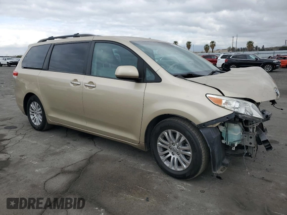 2011 Toyota Sienna XLE AAS with VIN 5TDYK3DC7BS110854, listed as a Copart auction lot 54604135 with 161,612 mi miles and Salvage Title. Bid and sale history available at DreamBid. Image 4.