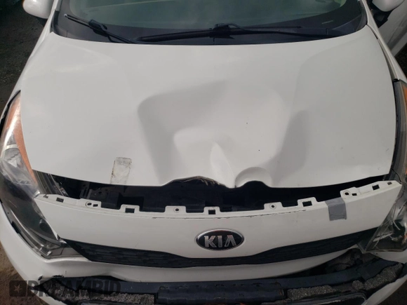 2014 Kia Rio LX with VIN KNADM5A34E6377346, listed as a Copart auction lot 82783993 with 107,160 mi miles and Salvage Title. Bid and sale history available at carsss.com. Image 11.