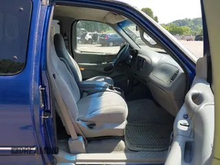 1998 Ford F-150 z VIN 2FTZX1727WCA55840, wystawiony jako IAAI lot #42437567 z przebiegiem 173 975 mil mil oraz . Historia ofert i sprzedaży dostępna na DreamBid. Obrazek 5.