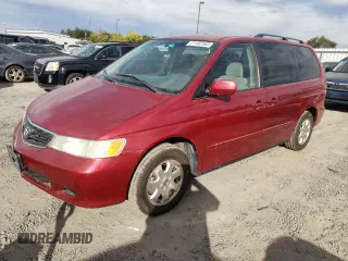 2002 Honda Odyssey EX with VIN 2HKRL18632H536413, listed as a Copart auction lot 71102553 with 131,193 mi miles and Salvage title. Bid and sale history available at DreamBid. Image 1.