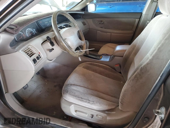 2000 Toyota Avalon XL z VIN 4T1BF28B3YU045264, wystawiony jako Copart lot #57519185 z przebiegiem 157 113 mil mil oraz Szkoda całkowita • Salvage title. Historia ofert i sprzedaży dostępna na DreamBid. Obrazek 7.